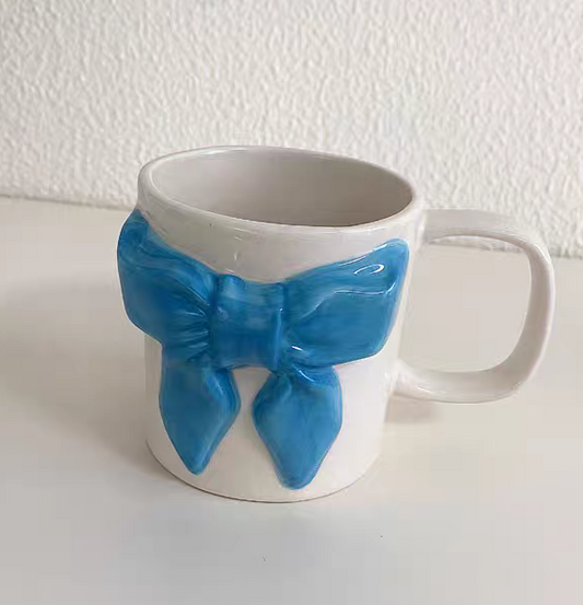Bow-tie designed cup