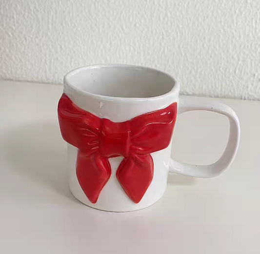 Bow-tie designed cup